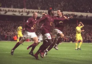 Kolo Toure celebrates scoring Arsenals 1st goal with Cesc Fabregas