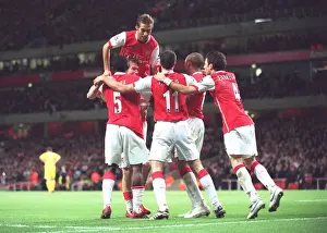 Kolo Toure celebrates scoring Arsenals 2nd goal with Mathieu Flamini