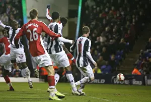 West Bromwich Albion V Arsenal 2008-9 Prints: Kolo Toure heads past West Brom goalkeeper Scott Carson