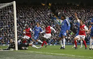 Kolo Toure and Mathieu Flamini celebrate Arsenals goal scored past Carlo Cudicini