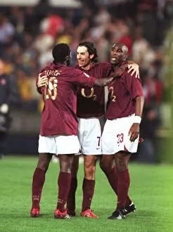 Campbell Sol Collection: Kolo Toure, Robert Pires and Sol Campbell (Arsenal) celebrate at the end of the match