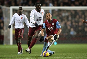 Aston Villa V Arsenal 2007-8 Prints: Kolo Toure vs John Carew: Arsenal's Edge in the Battle