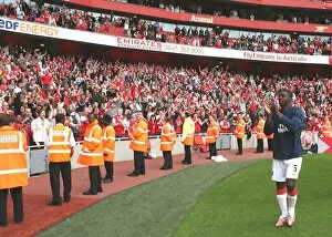 Kolo Toure waves to the Arsenal fans after the match
