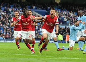 Manchester City V Arsenal 2012:13 Prints: Koscielny, Gervinho, and Giroud's Goal Celebration: Manchester City vs