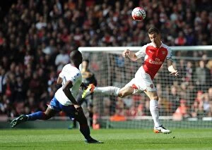 Images Dated 17th April 2016: Koscielny Stands Firm: Arsenal Star Fends Off Bolasie Threat in Intense Premier League Showdown