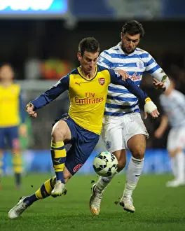 Koscielny vs. Austin: Intense Battle in Queens Park Rangers vs. Arsenal Premier League Clash