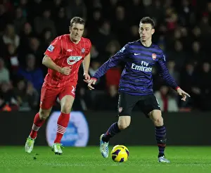 Southampton V Arsenal 2012-13 Prints: Koscielny vs Lambert: Intense Battle at Southampton's St Marys Stadium (Arsenal vs Southampton 2012-13)
