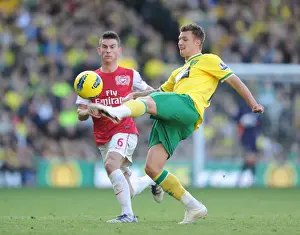 Norwich City V Arsenal 2011-12 Prints: Koscielny vs. Surman: Intense Battle in Norwich City vs. Arsenal (2011-12)