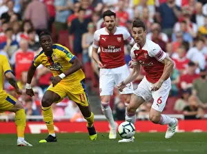 Arsenal V Crystal Palace 2018-19 Prints: Koscielny vs Zaha: A Battle of Defensive Giants in Arsenal vs Crystal Palace Clash