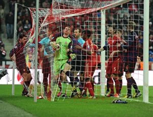 Bayern Munich Collection: Koscielny's Determined Battle with Neuer: Arsenal vs. Bayern Munich, UEFA Champions League 2012-13