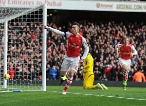 Images Dated 11th January 2015: Koscielny's Game-Winning Goal: Arsenal Overpowers Stoke City in Premier League 2014-15