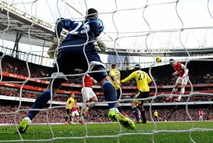 Arsenal v Sunderland 2013-14 Collection: Koscielny's Header: Arsenal Crush Sunderland 4-0 in Premier League