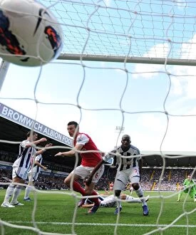 West Bromwich Albion v Arsenal 2011-12 Collection: Koscielny's Header: Securing Arsenal's Victory Against West Bromwich Albion (2011-12)