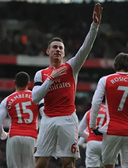 Arsenal V Stoke City 2014-15 Prints: Koscielny's Last-Minute Goal: Arsenal Snatch Dramatic Victory Against Stoke City