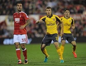 Nottingham Forest v Arsenal EPL Cup 3rd Round 2016-17 Collection: Krystian Bielik (Arsenal) Apostolos Vellios (Forest). Nottingham Forest 0: 4 Arsenal