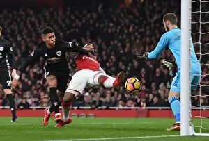 Arsenal V Manchester United 2017-18 Prints: Lacazette Fouls by Rojo: Intense Moment from Arsenal vs Manchester United (2017-18)