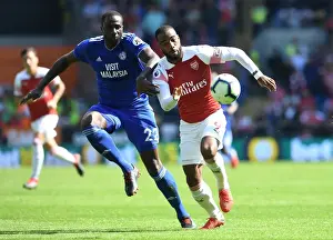 Lacazette vs. Bamba: Clash of the Titans in Cardiff's Premier League Showdown