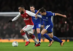Arsenal V Chelsea - Carabao Cup 2017-18 Prints: Lacazette vs. Christensen: A Battle in the Carabao Cup Semi-Final