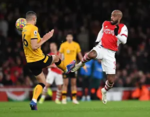 Lacazette vs. Coady: A Premier League Showdown at the Emirates