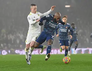 Lacazette vs. Forshaw: A Football Rivalry Ignites in Leeds United vs. Arsenal Clash
