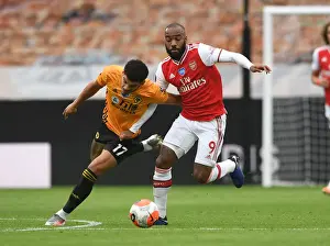 Lacazette vs Gibbs-White: A Battle in the Premier League Clash between Wolverhampton and Arsenal