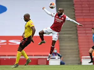 Lacazette vs. Kabasele: A Premier League Battle at Arsenal's Emirates Stadium