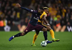 Wolverhampton Wanderers V Arsenal 2018-19 Prints: Lacazette vs. Traore: Battle at Molineux - Wolverhampton Wanderers vs