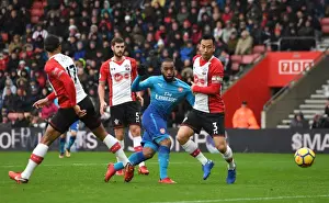 Southampton V Arsenal 2017-18 Prints: Lacazette vs Yoshida: Intense Moment at Southampton-Arsenal Premier League Clash