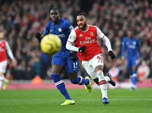 Arsenal V Chelsea 2019-20 Prints: Lacazette vs. Zouma: A Premier League Rivalry Clash - Arsenal vs. Chelsea (2019-20)