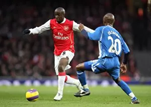 Lassana Diarra (Arsenal) Salomon Olembe (Wigan)