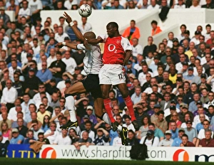Lauren (arsenal) Freddie Kanoute (Tottenham). Tottenham Hotsour v Arsenal Lauren (arsenal) Freddie Kanoute (Tottenham). Tottenham Hotsour v Arsenal