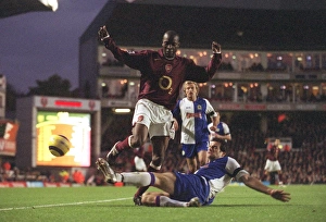 Arsenal v Blackburn Rovers 2005-6 Collection: Lauren (Arsenal) Ryan Nelsen (Blackburn). Arsenal 3: 0 Blackburn Rovers