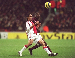 Arsenal v Ajax 2005-6 Collection: Lauren (Arsenal) Steven Pienaar (Ajax). Arsenal 0: 0 Ajax