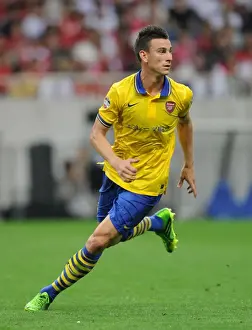 Uwara Red Diamonds V Arsenal 2013-14 Prints: Laurent Koscielny in Action: Arsenal vs Urawa Red Diamonds, Japan 2013