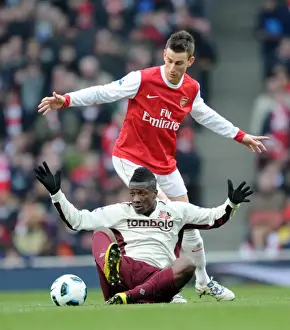 Arsenal V Sunderland 2010-11 Prints: Laurent Koscielny (Arsenal) Asamoah Gyan (Sunderland). Arsenal 0: 0 Sunderland