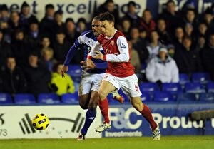 Images Dated 1st January 2011: Laurent Koscielny (Arsenal) Cameron Jerome (Birmingham). Birmingham City 0: 3 Arsenal