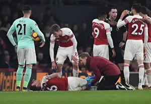 Laurent Koscielny (Arsenal) Jordan Reece (Arsenal Physio)