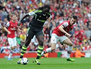 Laurent Koscielny (Arsenal) Kenwyne Jones (Stoke). Arsenal 3: 1 Stoke City. Barclays Premier League