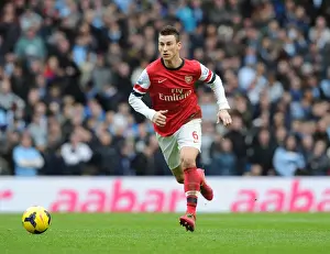 Manchester City V Arsenal 2013-14 Prints: Laurent Koscielny (Arsenal). Manchester City 6: 3 Arsenal. Barclays Premier League