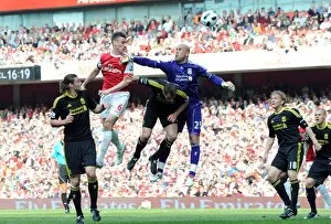Images Dated 17th April 2011: Laurent Koscielny (Arsenal) Pepe Reina (Liverpool). Arsenal 1: 1 Liverpool
