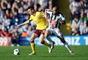 Images Dated 19th March 2011: Laurent Koscielny (Arsenal) Peter Odemwingie (WBA). West Bromwich Albion 2: 2 Arsenal