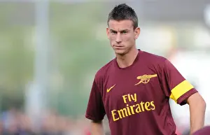 SC Neusiedl V Arsenal Prints: Laurent Koscielny (Arsenal). SC Neusiedl 0: 4 Arsenal, Sportzentrum Neusiedl