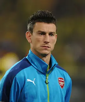 Borussia Dortmund V Arsenal 2014-15 Prints: Laurent Koscielny: Arsenal's Fortitude Before Borussia Dortmund in the UEFA Champions League (2014-15)