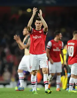 Arsenal V Napoli 2013-14 Prints: Laurent Koscielny: Arsenal's Steadfast Defender Against Napoli in the Champions League (2013)