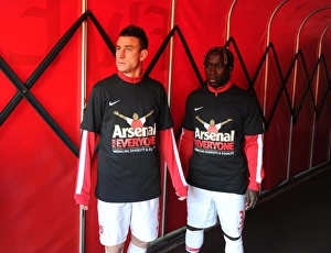 Laurent Koscielny and Bacary Sagna (Arsenal) in their Arsenal for Everyone Tshirts Laurent Koscielny and Bacary Sagna (Arsenal) in their Arsenal for Everyone Tshirts