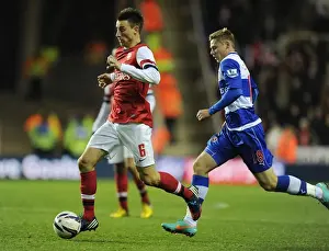 Reading V Arsenal - Capital One Cup 2012-13 Prints: Laurent Koscielny Breaks Past Simon Church: Arsenal's Capital One Cup Victory over Reading (October 2012)