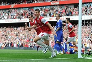 Arsenal v Bolton Wanderers 2010-11 Collection: Laurent Koscielny celebrates scoring the 1st Arsenal goal with Sebastien Squillaci