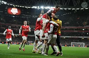 Images Dated 25th January 2011: Laurent Koscielny celebrates scoring the 2nd Arsenal goal with Johan Djourou