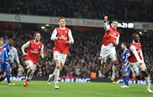 Images Dated 25th January 2011: Laurent Koscielny celebrates scoring the 2nd Arsenal goal with Johan Djourou