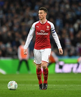 Arsenal V Manchester City - Carabao Cup Final 2018 Prints: Laurent Koscielny Focused at Arsenal vs Manchester City Carabao Cup Final